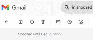 Screenshot of Gmail inbox showing an e-mail snoozed until December 31, 2999